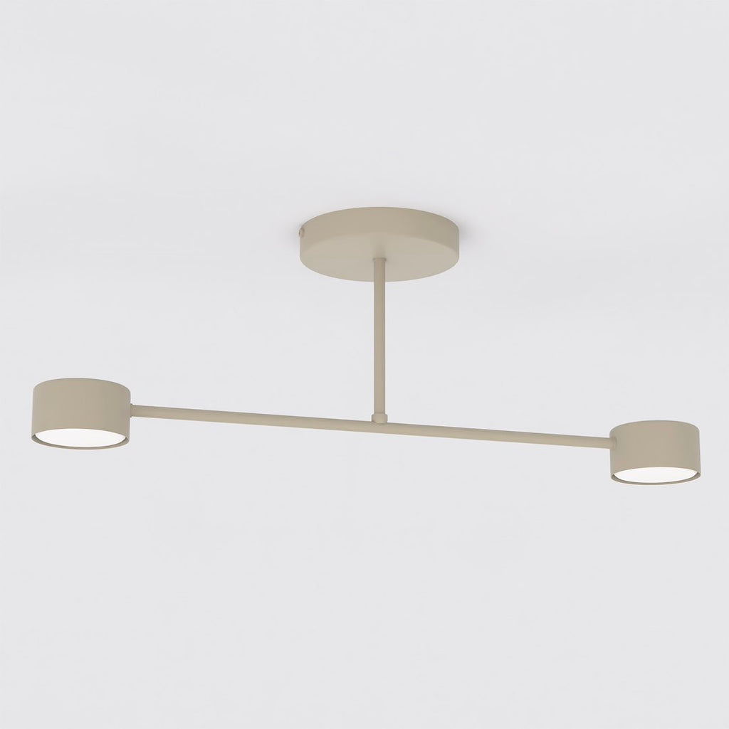 Beige plafondlamp met horizontale arm en twee ronde lichtpunten aan een ronde plafondplaat