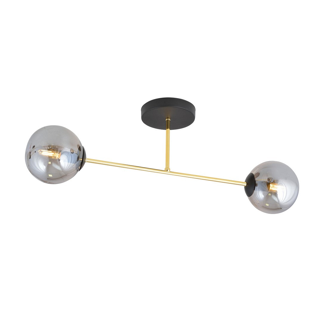 Plafondlamp met twee grijze glazen bollen aan een gouden arm en een zwarte plafondplaat