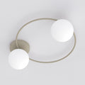 Plafondlamp met beige cirkelvormig frame en twee witte glazen bollen tegen een lichte achtergrond
