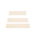 Set van drie beige metalen wandplanken met opstaand randje in drie lengtes onder elkaar