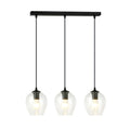 Hanglamp met zwarte balk en drie transparante glazen kappen met brandende lampen