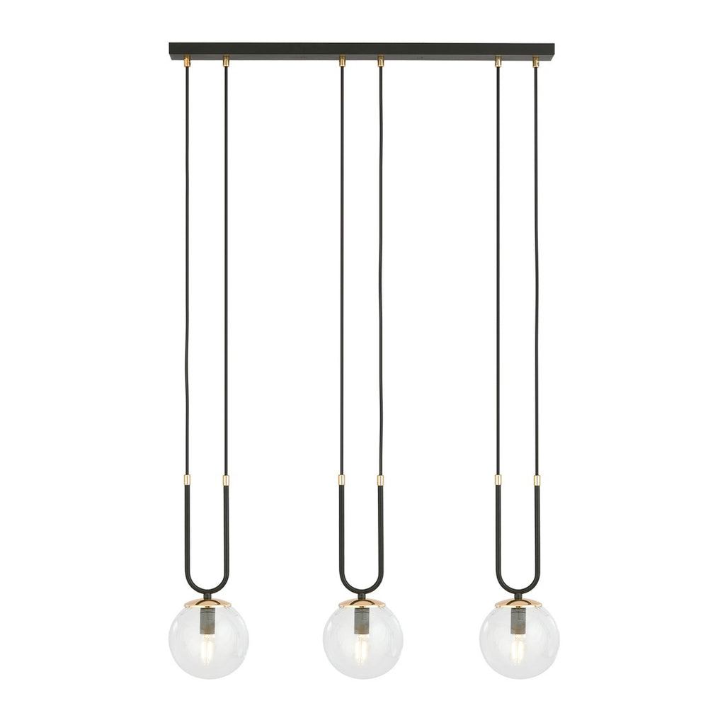Zwarte hanglamp met drie transparante glazen bollen en gouden details aan een langwerpige plafondkap