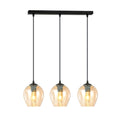 Hanglamp met drie amberkleurige glazen kappen aan een zwarte balk met zwarte snoeren