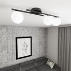 Plafondlamp gepoedercoat staal modern Caïro 3 lichts, mat zwart met witte glazen bolkappen, 74 x 20 cm