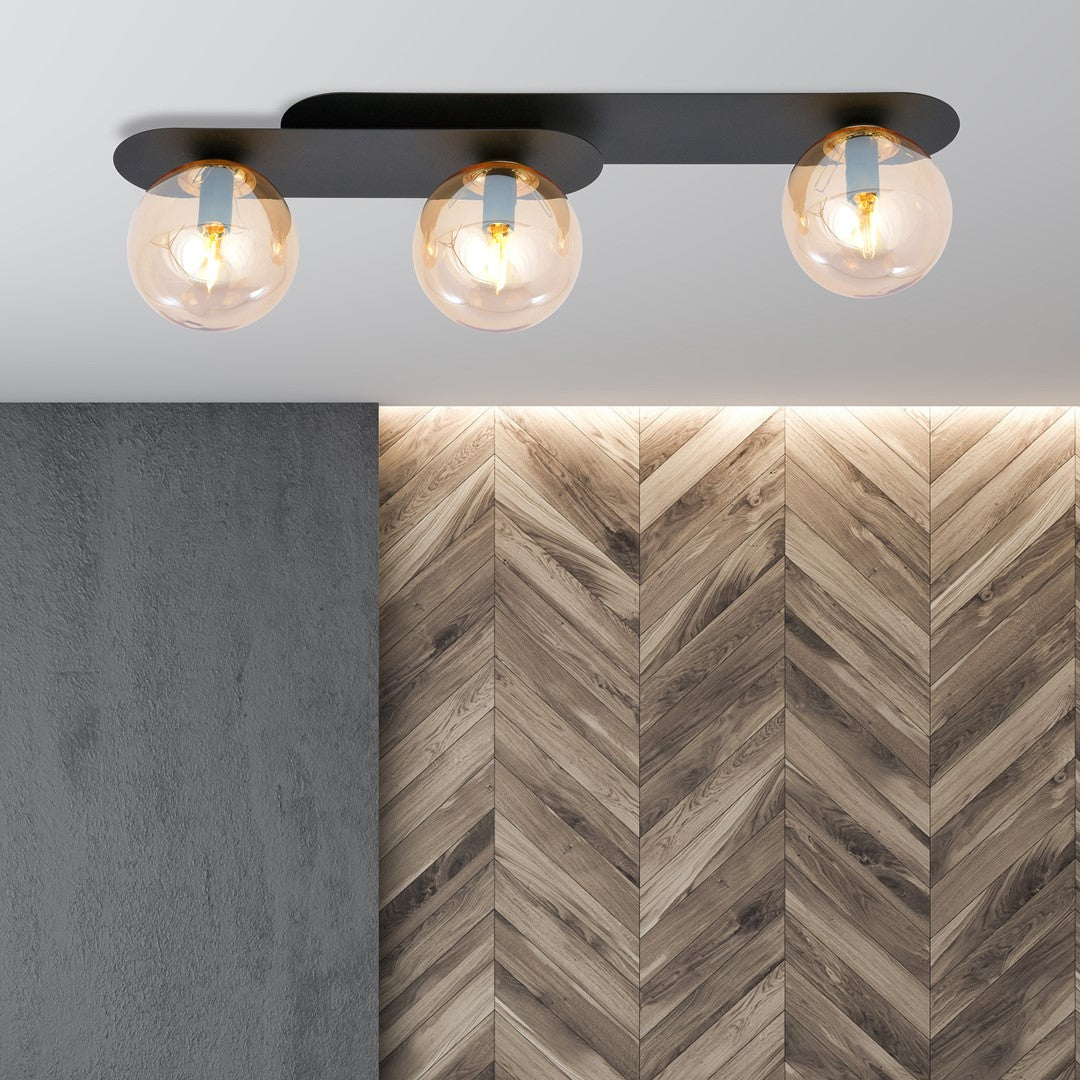 Plafondlamp gepoedercoat staal en glas Plaza, zwart met amberkleurige kappen, 3 lichtpunten, 70 x 18 cm