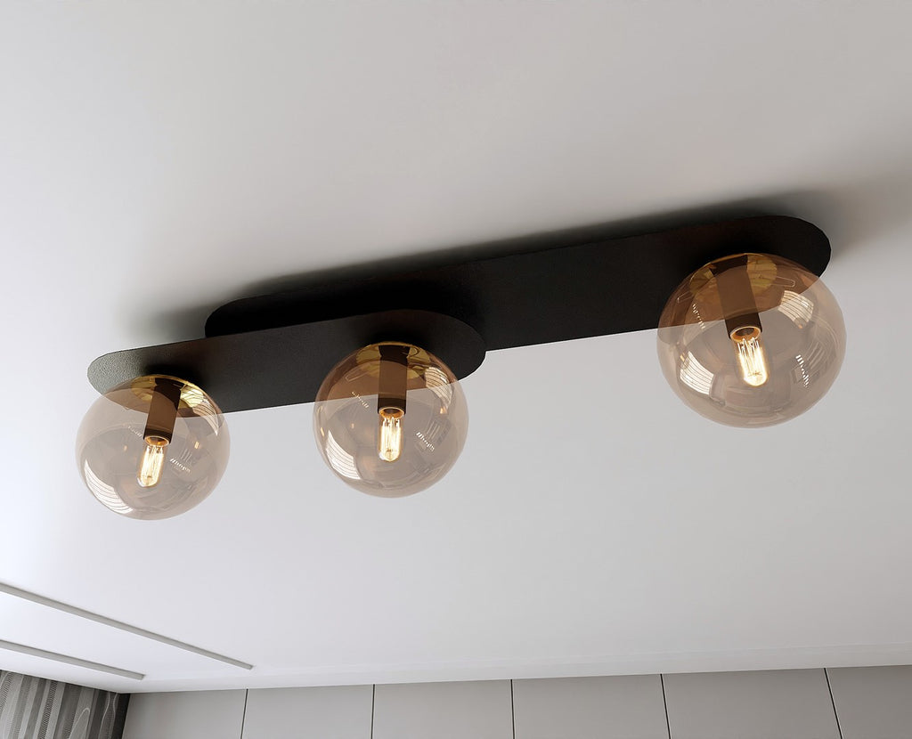 Plafondlamp gepoedercoat staal en glas Plaza, zwart met amberkleurige kappen, 3 lichtpunten, 70 x 18 cm
