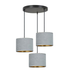 Hanglamp met drie grijze stoffen kappen met gouden binnenzijde aan een ronde zwarte canopy