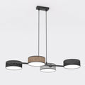 Zwarte lineaire hanglamp met vier cilindrische geweven kappen in zwart, bruin en grijs
