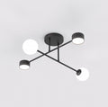 Zwarte plafondlamp met gekruiste armen, twee witte lichtbollen en twee kleine platte lampjes