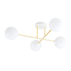 Plafondlamp met vier witte glazen bollen aan gouden armen en een witte plafondplaat