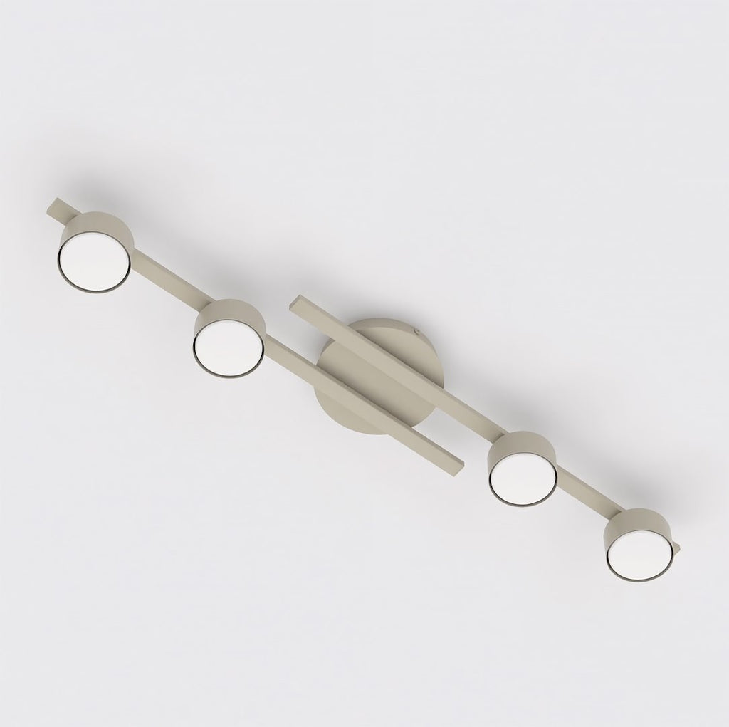Beige plafondlamp met vier ronde lichtpunten op twee asymmetrische armen rond een ronde plafondplaat