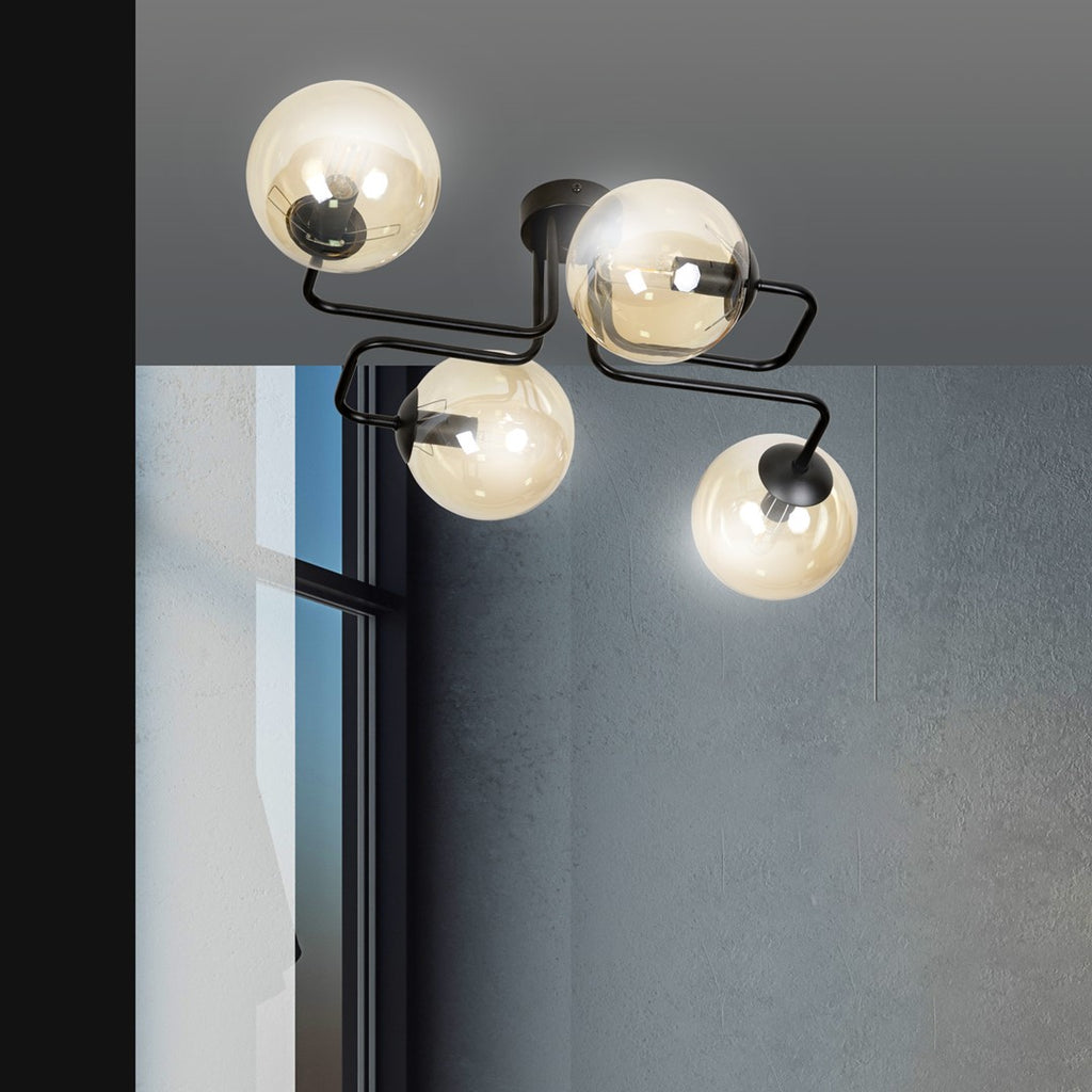 Plafondlamp staal en glas Brendi modern zwart met amber glazen kappen, 4 fittingen E14, 55 cm breed