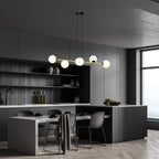 Hanglamp gepoedercoat staal en glas Gravity, zwart met goud en witte glazen kappen, 6 lichts, 110 cm breed