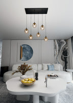 Hanglamp 6 lichts gepoedercoat staal en glas, Cosmo modern, zwart met amberkleurige kappen, 65 x 120 cm