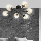 Plafondlamp gepoedercoat staal en glas Brendi, zwart met amberkleurige glazen kappen, 6 lichts, 75 cm breed