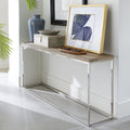 Consoletafel met houten blad en glanzend stalen frame, gestyled met blauwe vaas, kist, schaal en ingelijste print