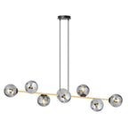 Zwart-gouden hanglamp met acht grafietkleurige glazen bollen aan een horizontale balk