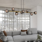 Hanglamp staal glas Gravity glamour zwart met goud en grafiet kappen, 8 lichts, 140 x 100 cm