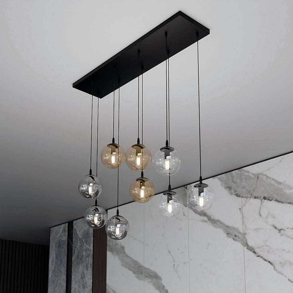 Hanglamp gepoedercoat staal en glas Cosmo zwart, 9 glazen kappen transparant, grafiet en amber, 104 x 120 cm