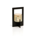 Zwart metalen windlicht met rechthoekig frame, kruisvoet en glazen cilinder met amberkleurige glans