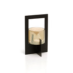 Zwart metalen windlicht met rechthoekig frame, kruisvoet en glazen cilinder met amberkleurige glans