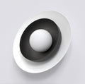 Ronde witte lampenkap in een zwarte ovale schaal met witte buitenste schijf, wandlamp Poppi