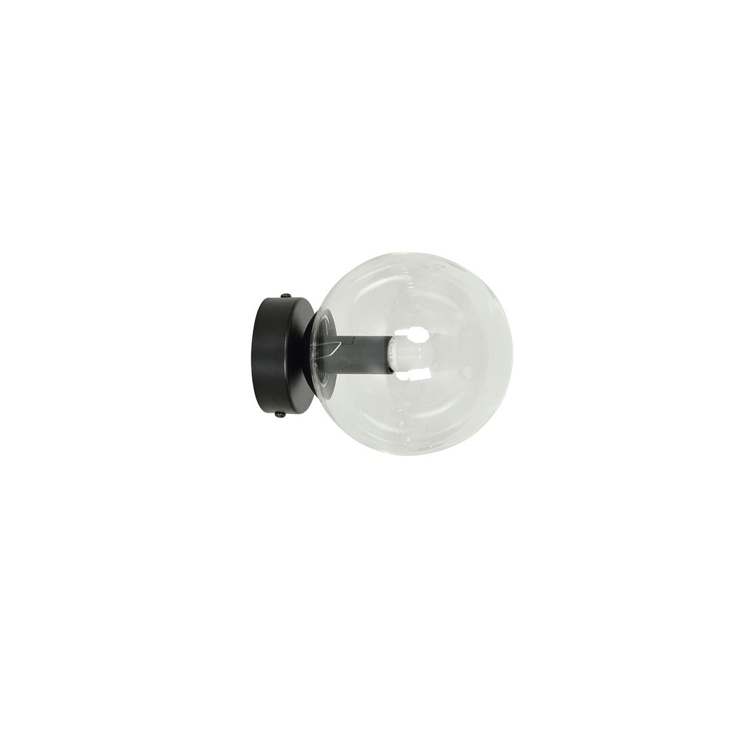 Zwarte wandlamp met ronde transparante glazen kap en zichtbare lamp op een ronde zwarte wandplaat