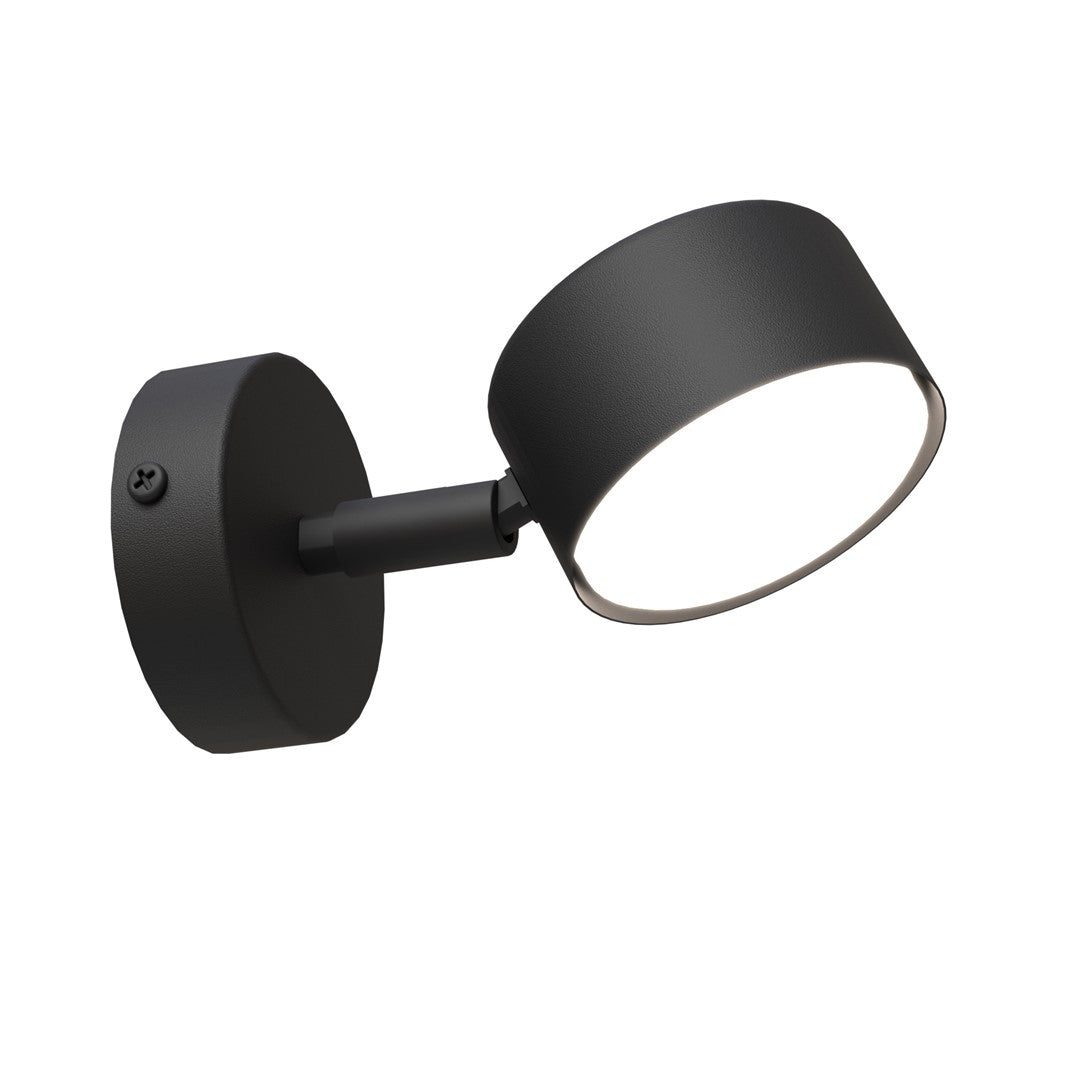 Zwarte wandlamp met ronde wandplaat, korte arm en ronde lampenkop met verlichte onderzijde