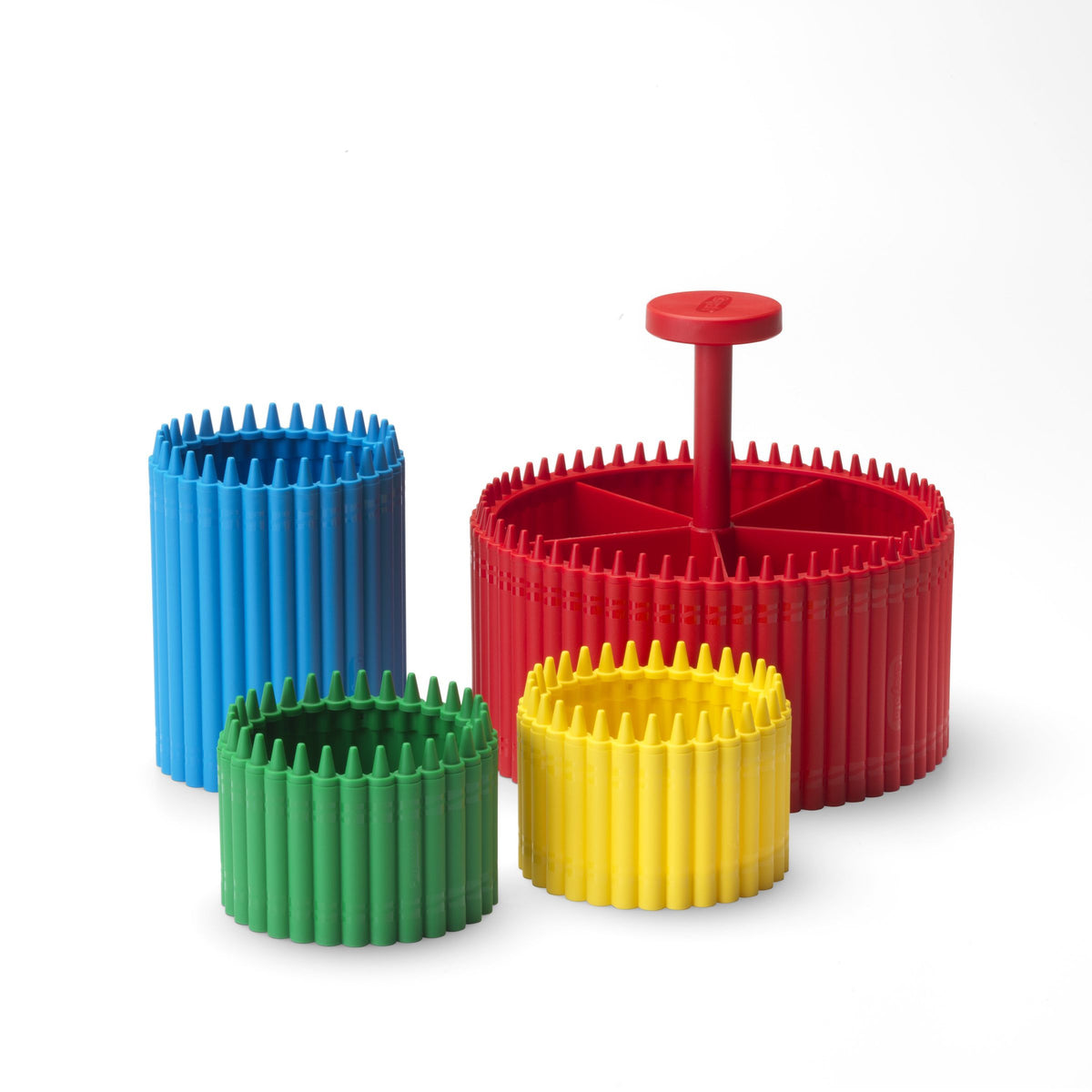 Set van vier opbergbakjes in potloodvorm: blauw, groen, geel en een rood rond model met vakjes en handvat